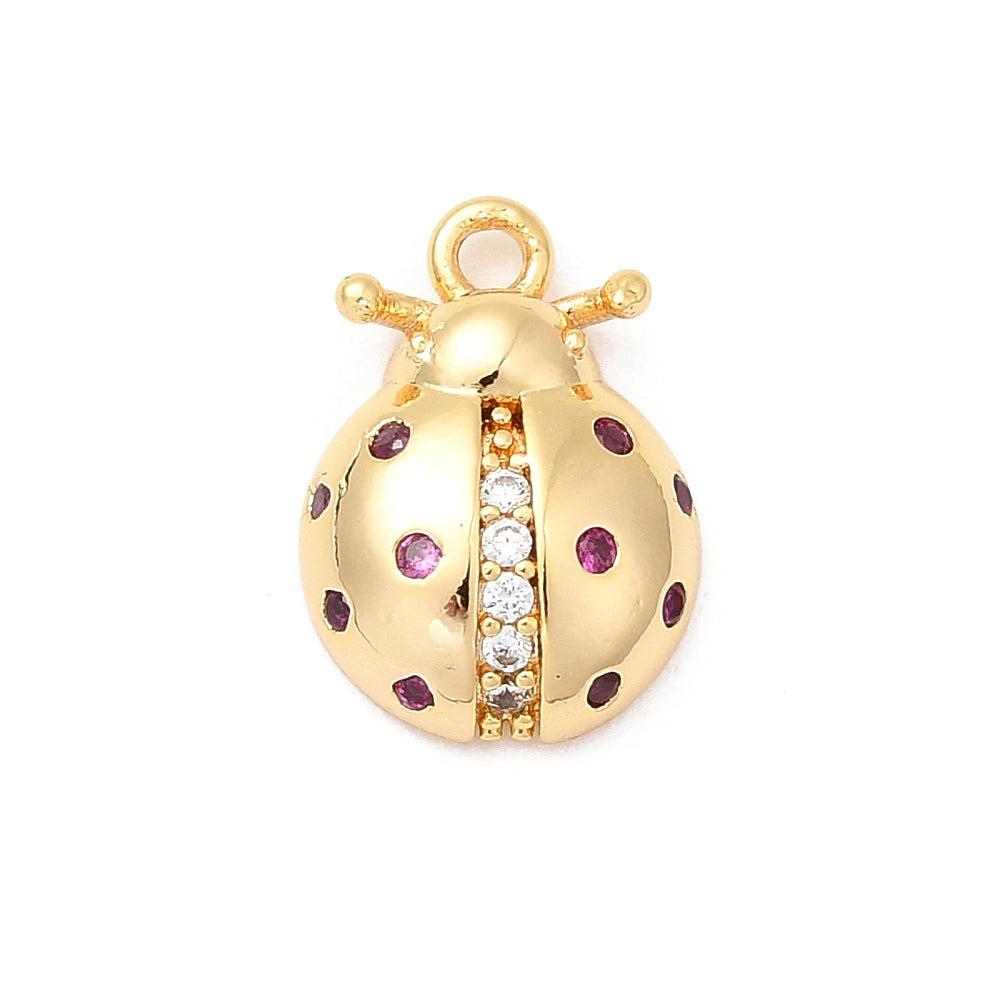 Gold-tone ladybug charm by Good Day, Darling, featuring pink stone spots and a center row of clear crystals.