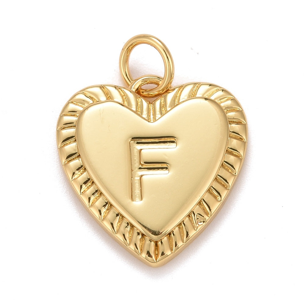 Gold-tone heart-shaped initial charm featuring an embossed letter F and a textured, ridged border.