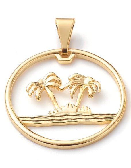 Circular gold-tone charm featuring two palm trees on a small island with waves, suspended from a polished bail.
