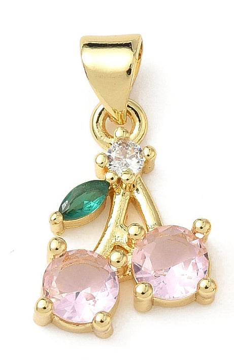 Gold-tone charm shaped like pink cherries with faceted pink stones, a green leaf, and a clear accent stone.