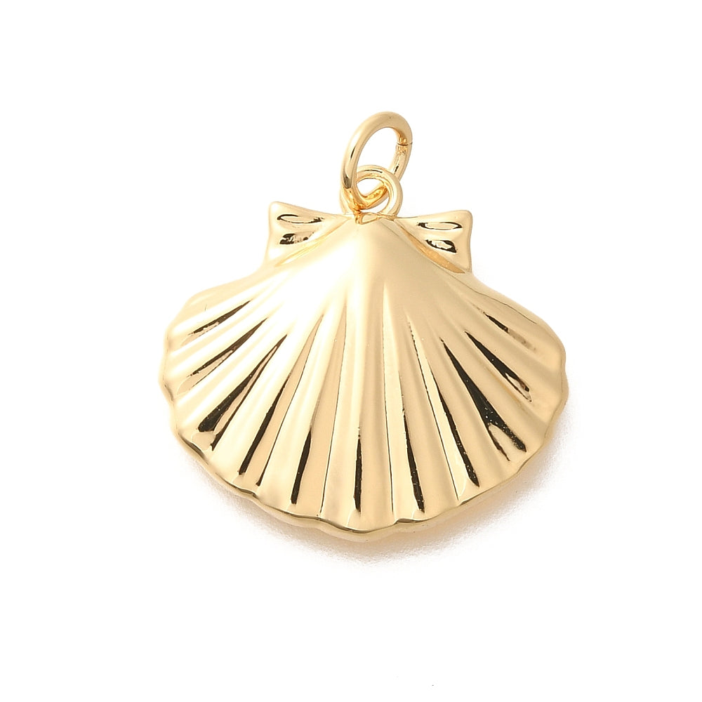 A ribbed gold-tone charm shaped like a seashell with an attached top jump ring.