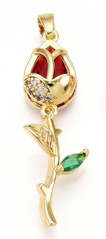 Stemmed rose gold-tone charm featuring a red gemstone bud, clear stone accents, and a green marquise gemstone leaf.