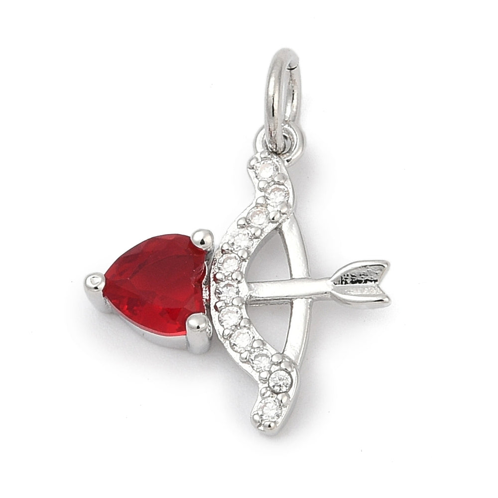 Silver Cupids bow charm featuring a red heart-shaped stone arrowhead and clear crystals on the bow.