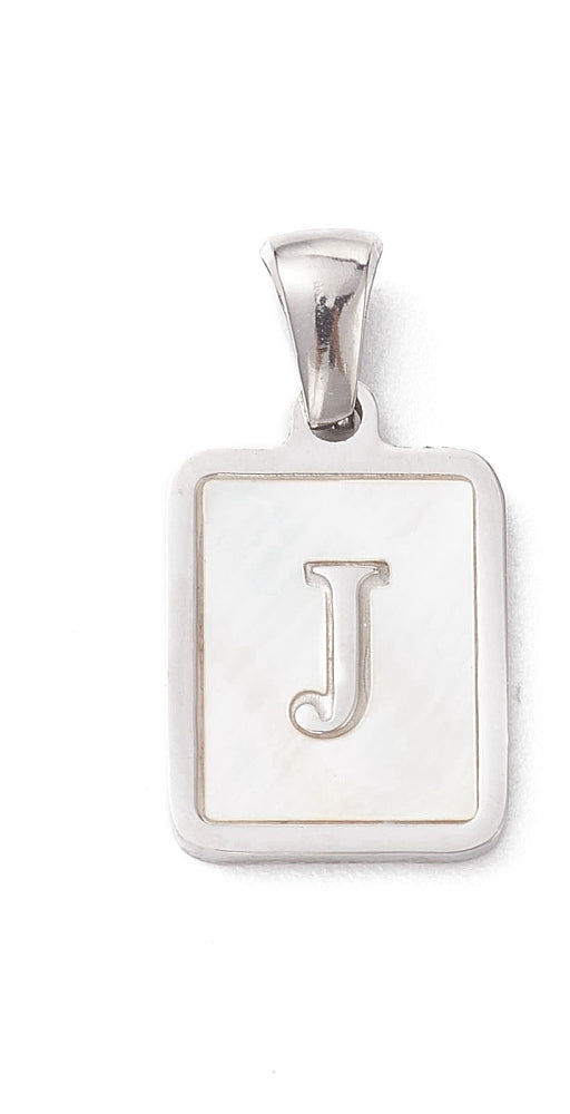 A silver-tone rectangular initial charm featuring a white pearl inlay and the letter J, by Good Day, Darling.