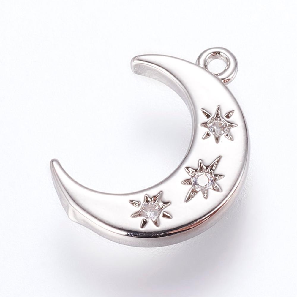 Silver-tone crescent moon charm featuring three engraved starburst details set with small clear stones.