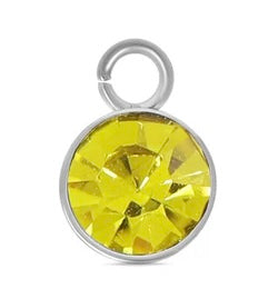 A round, faceted yellow crystal November birthstone charm set in a silver-tone bezel with an attached jump ring.