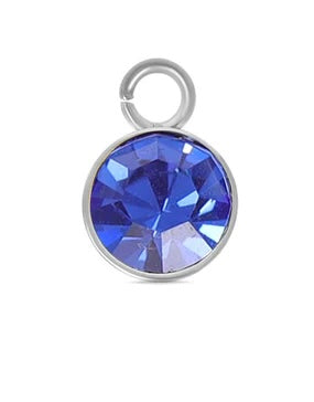 Silver September birthstone charm featuring a round, faceted royal blue crystal in a silver-tone bezel setting.