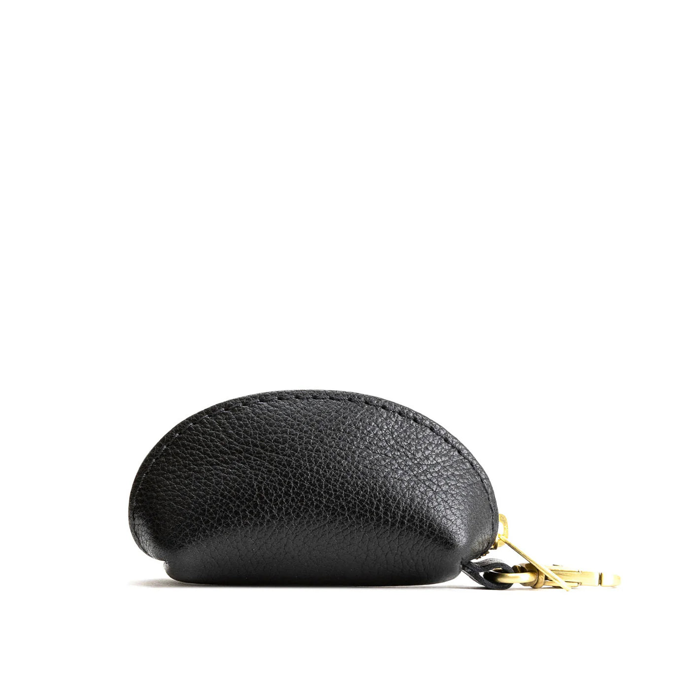 Black pebbled leather taco key chain pouch with gold-tone zipper and clasp hardware.