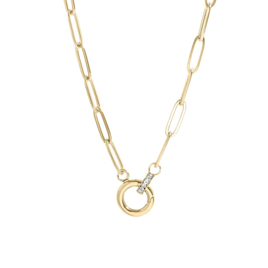 Gold paperclip carabiner necklace featuring a circular clasp detailed with a row of small clear stones.