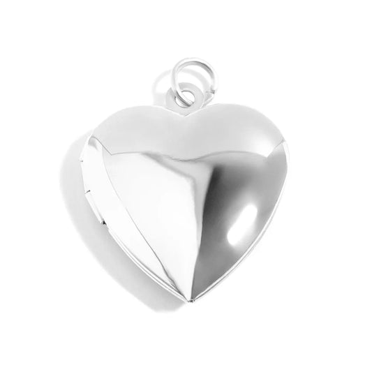 Polished silver heart locket pendant with a smooth, reflective surface and top bail on a white background.