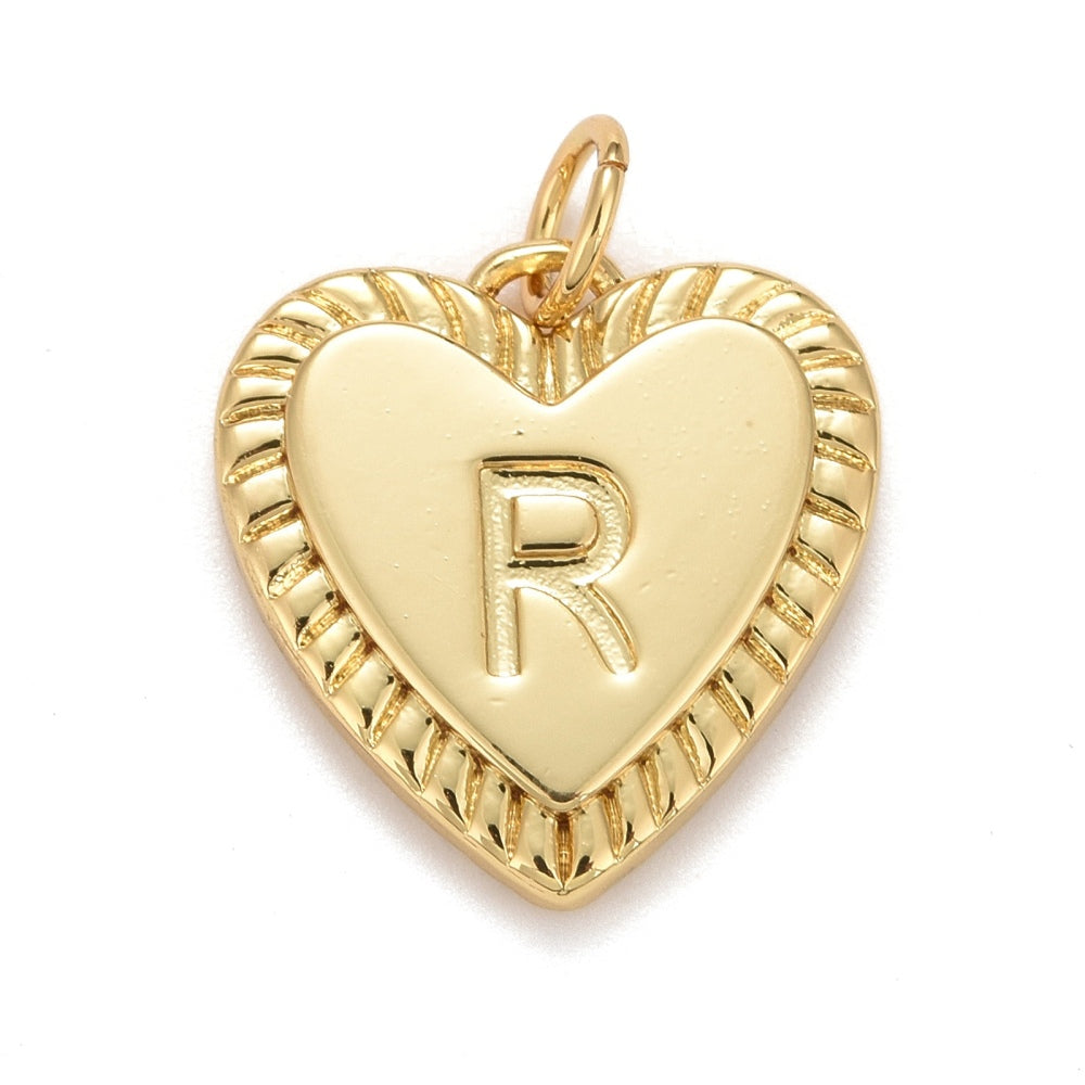 Gold-tone heart initial charm with a raised letter R and a textured, ribbed border.