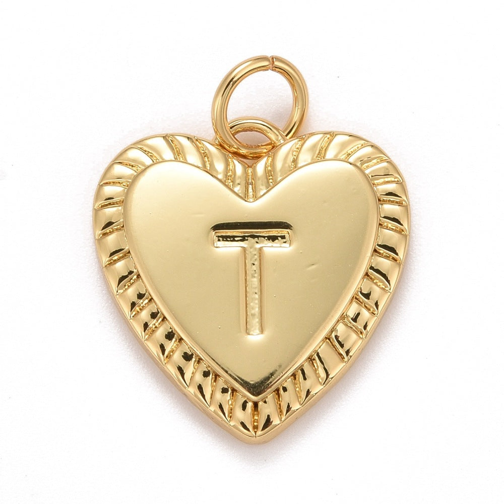 Gold-tone heart-shaped initial charm featuring the letter T with a textured, ribbed border.