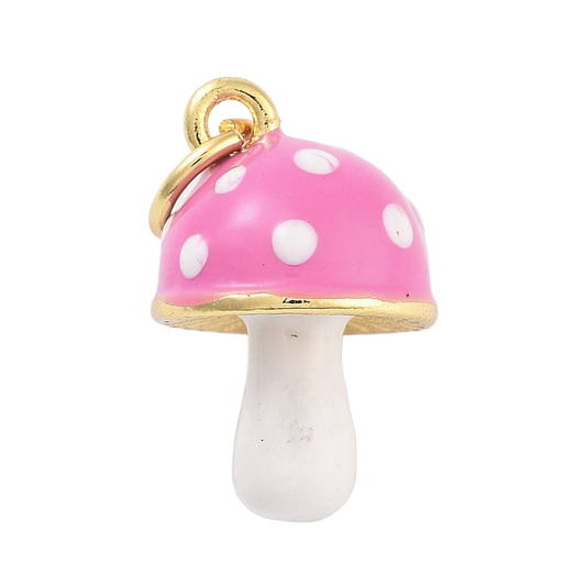 Pink mushroom gold-tone charm with a white-dotted pink enamel cap, white stem, and a top jump ring.