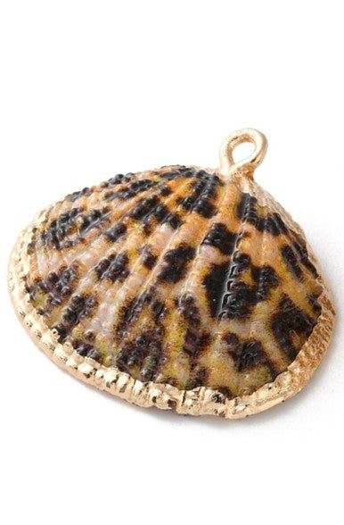 Gold-tone charm shaped like a seashell with a brown and black cheetah print pattern and a textured gold border.