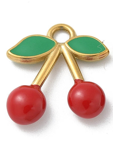 Gold-tone charm featuring two glossy red cherries and green enamel leaves, with a top loop for attachment.