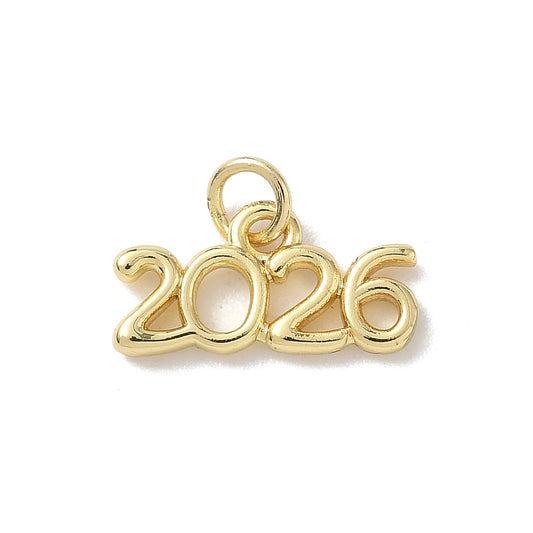 Gold-tone charm featuring the year 2026 in a polished finish with an attached jump ring.