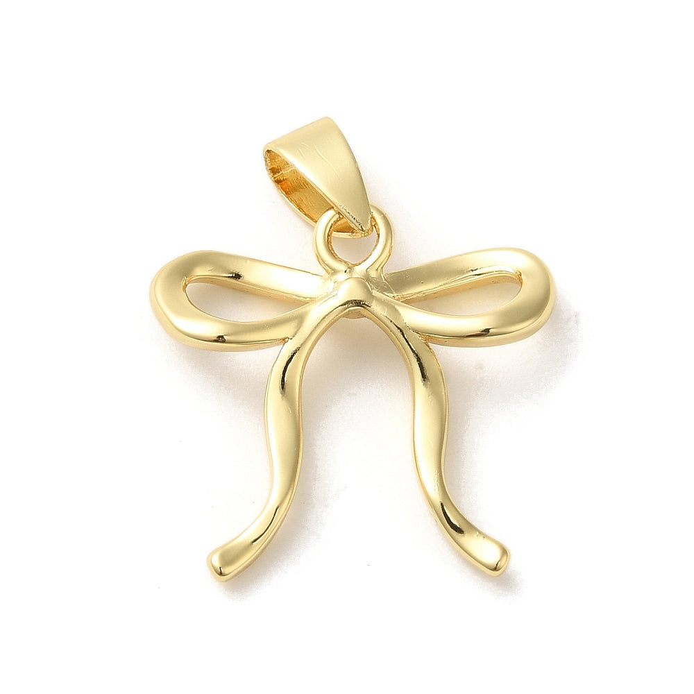 A shiny gold bow charm with a polished finish and a top bail for attaching to a necklace.