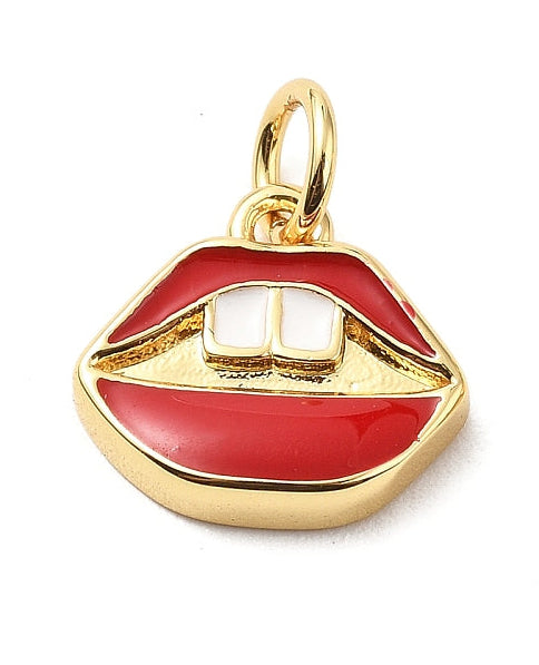 Gold-tone charm shaped like red enamel lips slightly parted to reveal two white teeth, attached to a jump ring.