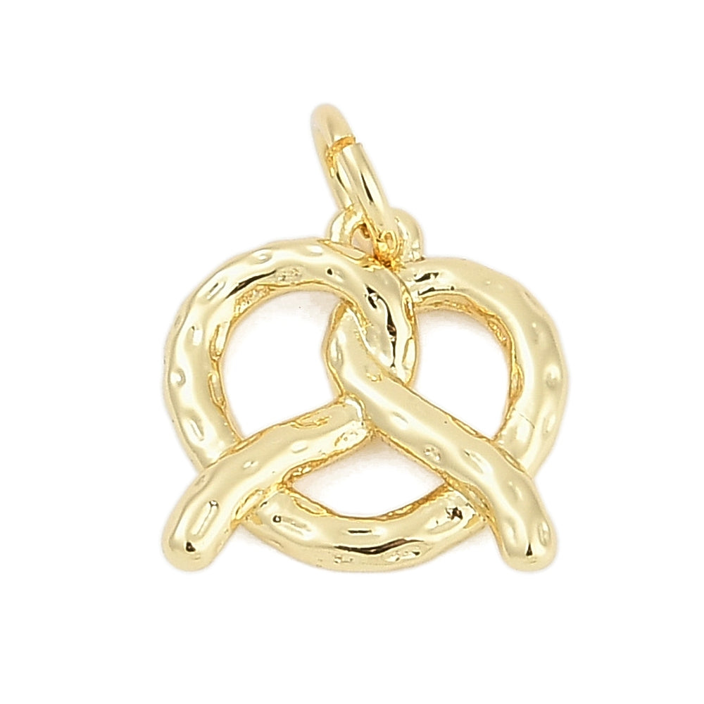 A gold pretzel charm featuring a textured, dimpled surface and a top loop for attachment.