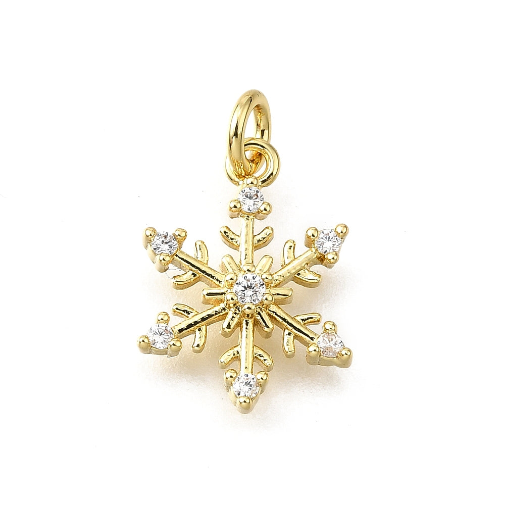 Gold snowflake charm with clear stone accents on each point and a top jump ring.
