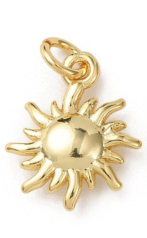 A polished gold-tone charm in a celestial sun shape with wavy rays and a top jump ring.