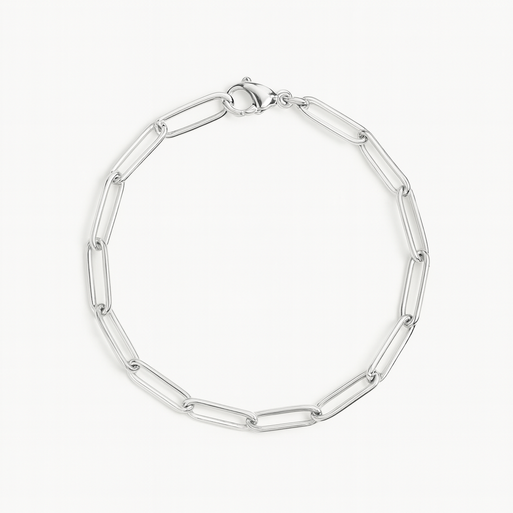 Silver paperclip bracelet featuring polished, elongated rectangular links and a lobster clasp closure, shown on a white background.