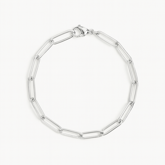 Silver paperclip bracelet featuring polished, elongated rectangular links and a lobster clasp closure, shown on a white background.