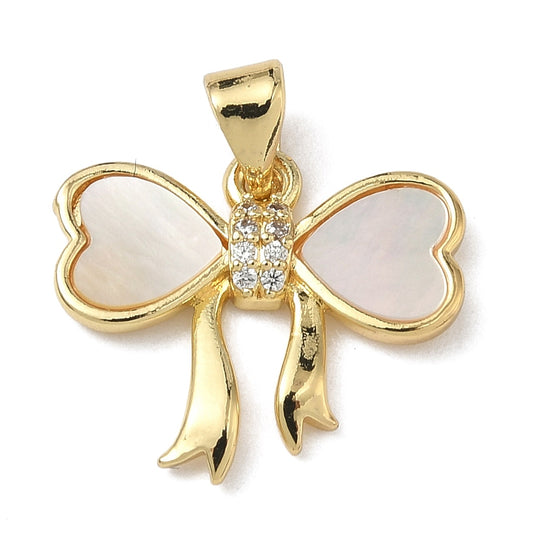 Mother of pearl bow charm featuring gold-tone metal, heart-shaped iridescent inlays, and a crystal-studded center knot.