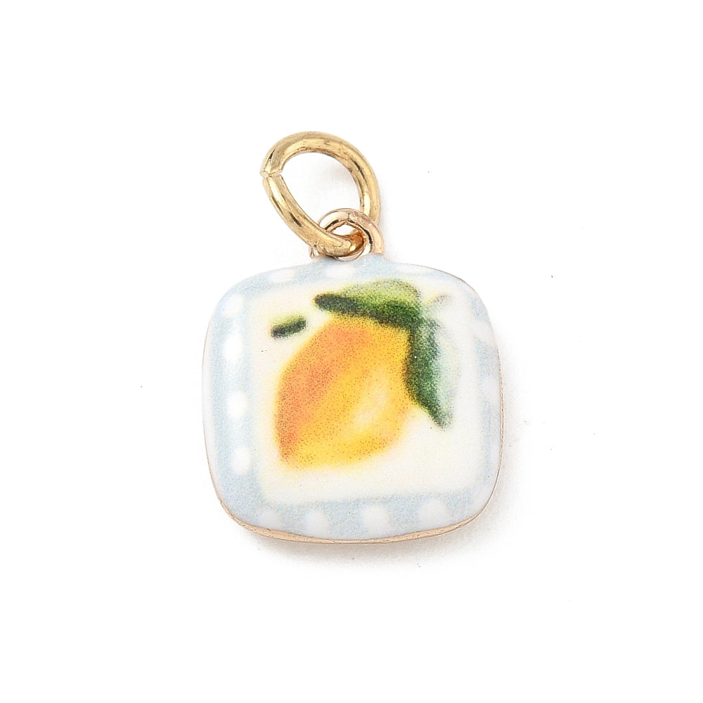 Vintage lemon gold-tone charm with a painted yellow lemon illustration on a rounded square enamel tile.