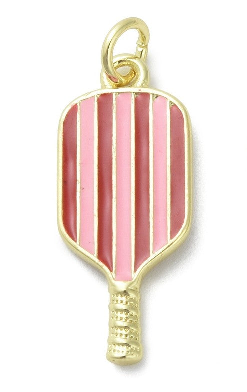 Gold-tone charm shaped like a pickle ball paddle, featuring alternating light and dark pink enamel stripes and a textured handle.