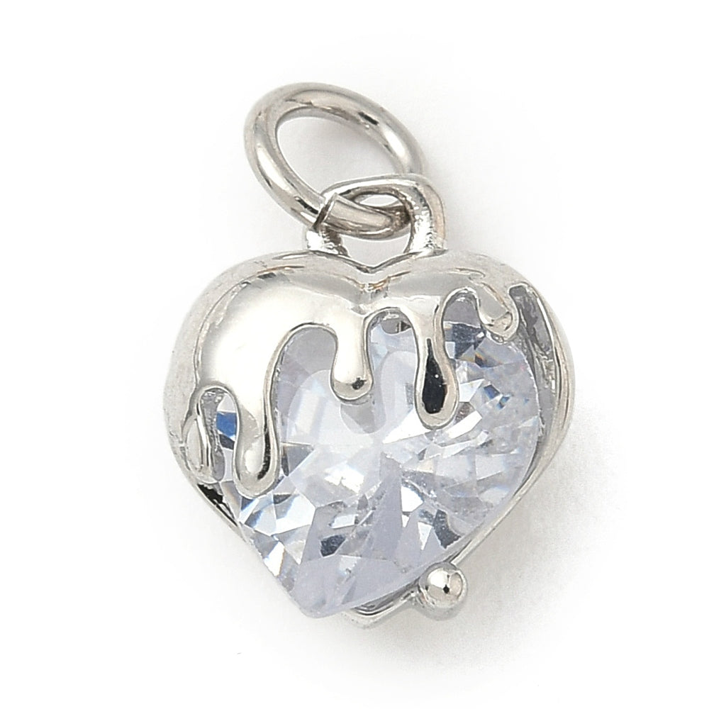 Silver melting heart charm featuring a faceted clear crystal heart with a dripping silver-tone metal overlay.