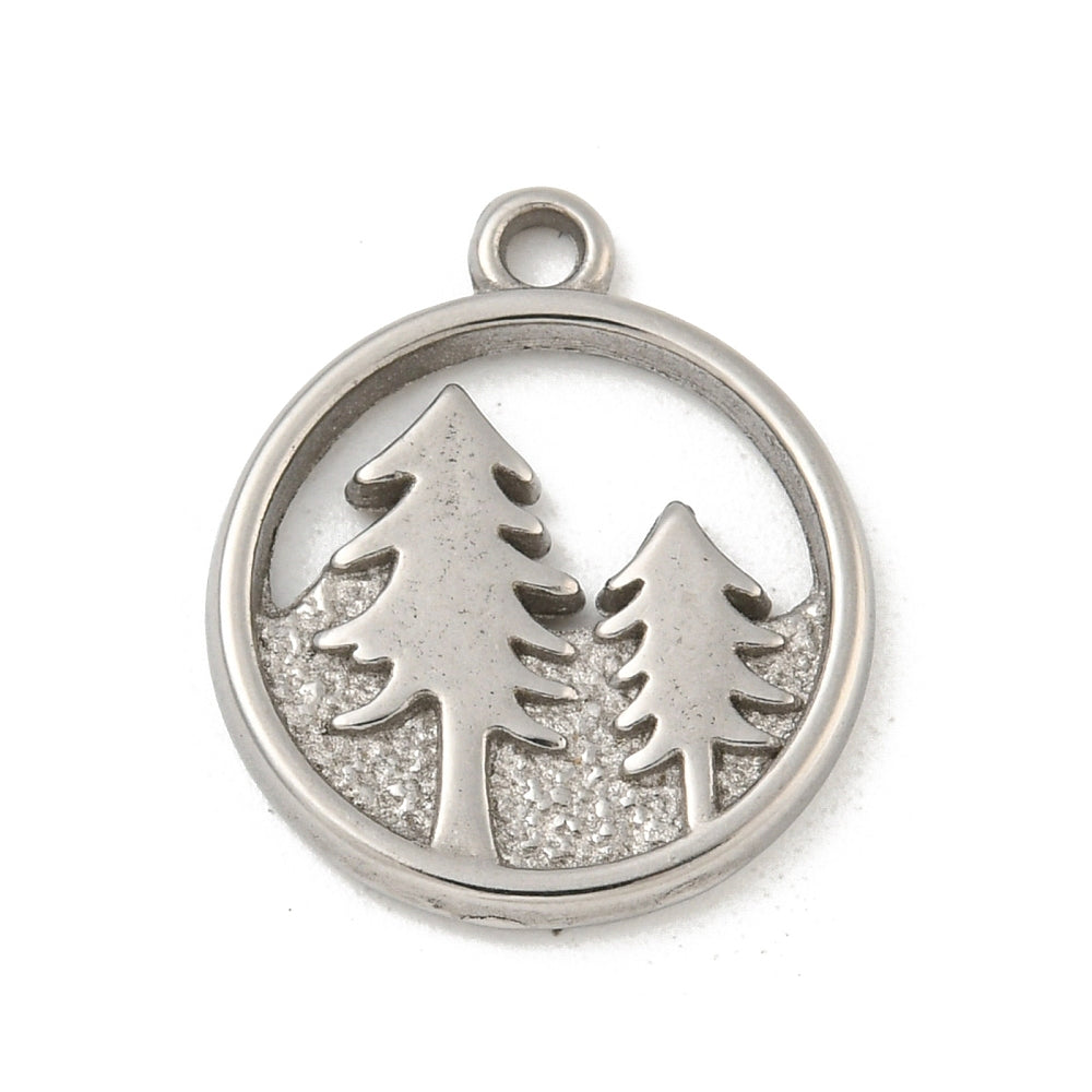 Circular silver-tone charm featuring two silver evergreen trees with a textured ground design and a top loop.
