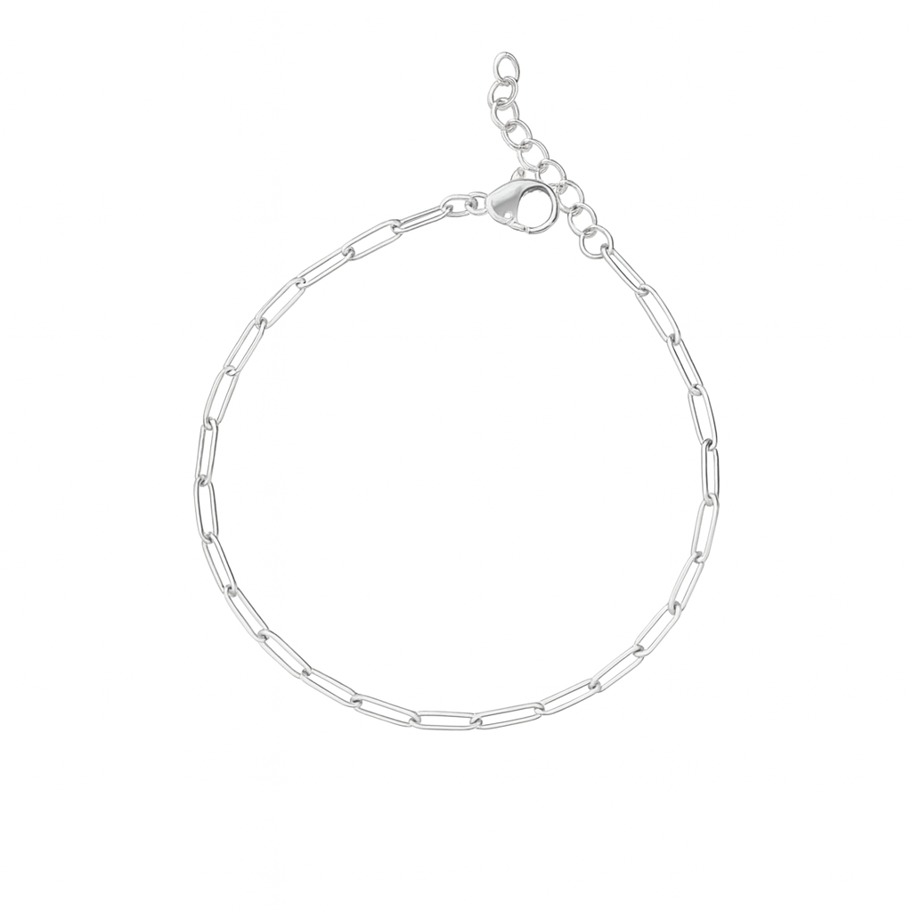 Dainty silver paperclip bracelet featuring elongated rectangular links, a lobster clasp, and an adjustable extender chain.