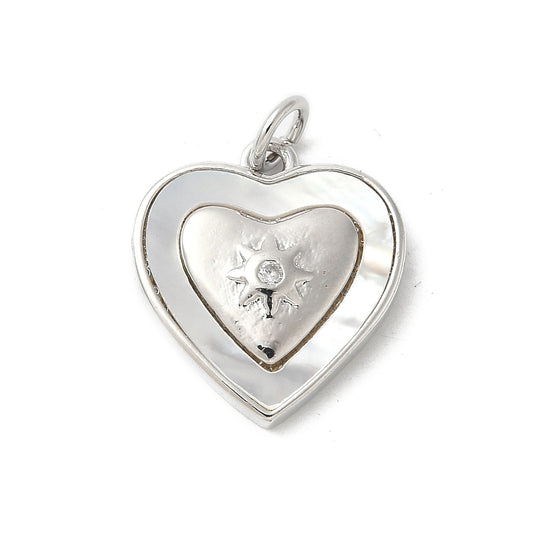 Silver Star Heart charm featuring a double heart design with a white inlay and an engraved starburst center.
