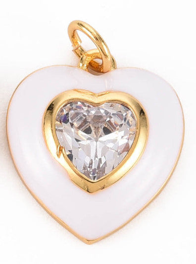 White Bezel Heart charm featuring a white enamel border surrounding a clear, heart-shaped faceted stone in a gold-tone setting.